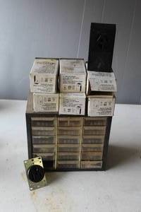 lot 458 image: small parts storage cabinet full and Leviton 5050 Black 3-Pole, 3-Wire Non-Grounding Power Outlets and more see pictures for details took pictures most