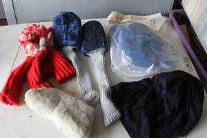 lot 514 image: Golf club covers and blue slippers with spikes for golfing