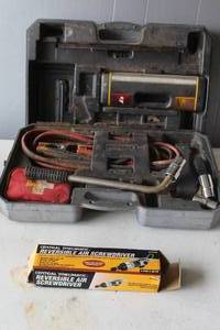 lot 545 image: Central Pneumatic 14 in. Reversible Air Impact Screwdriver.  And automotive emergency roadside assistance kit not all there see pictures