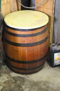 lot 561 image: Barrel table about 2 foot tall and about 17 inches wide