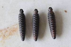 lot 568 image: vintage cast iron cuckoo clock weights shaped like pine cones