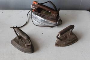 lot 610 image: 2-antique cast iron sad iron, and vintage electric clothes iron