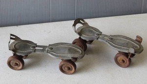 lot 625 image: vintage metal roller skates, likely from the 1930s to 1950s,