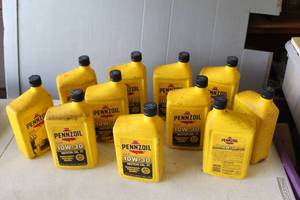 lot 641 image: multiple bottles of Pennzoil 10W-30 Conventional Motor Oil.  Unopened