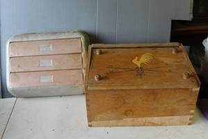 lot 654 image: vintage Kromex wall-mounted dispenser unit designed for kitchen essentials like aluminum foil, wax paper, and paper towels.  And vintage wooden bread box