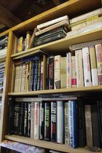 lot 655 image: 3-shelfs of books thats been locked away for years see pictures for titles