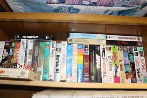 lot 662 image: Shelf full of VHSS
