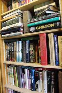 lot 664 image: 3- Shelfs  of books been locked away for years see pictures for titles