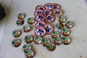 lot 672 image: collectible embroidered patches from the U.S. Army Corps of Engineers  and collectible pinback buttons feature the U.S. Forest Service anti-pollution mascot, Woodsy Owl.