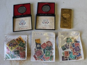 lot 673 image: collection of vintage postage stamps and collection of vintage postage stamps and a facsimile gold 1 kilo bar  ( this is not a real  1 Kilo bar )