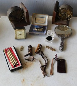 lot 685 image: Mixed lot with book ends and vintage Bulova President A wristwatch and vintage Kienzle travel alarm clock made in Germany and more see pictures for details