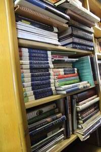 lot 691 image: 3- shelfs of books thats been locked away for years