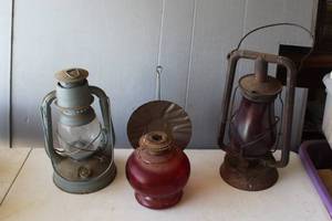 lot 694 image: vintage Dietz Little Wizard Oil Lantern and vintage Dietz Monarch railroad lantern and oil lamp