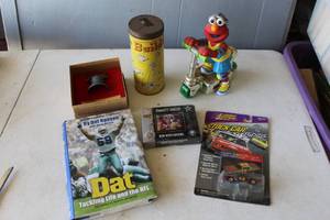 lot 695 image: collectible souvenir replica of the Liberty Bell with paper work and 2000l Sesame Street Elmo toy and Buildo Company construction set and much more see pictures for details