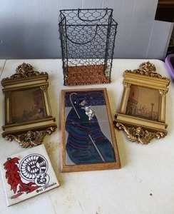 lot 707 image: decorative items includes ceramic tile mural depicting a religious figure and 2-wall hanging plaque featuring a scene of Venice, Italy.Cleo Teissedre Indian Trivet Tile,chicken wire handbag basket