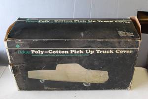 lot 810 image: Deluxe Poly-Cotton Pick Up Truck Cover.