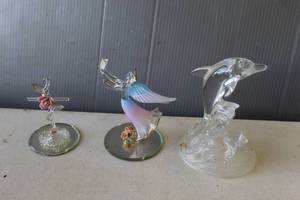 lot 753 image: Glass Baron Glass Pink Rose Cross with Vine, featuring a handcrafted clear glass cross and Glass Baron lavender angel figurine and dolphin figurine