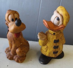 lot 754 image: ceramic figurine of the Disney character Pluto and  ceramic figurine of Walt Disneys character Donald Duck bothe stamps see pictures