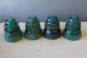 lot 760 image: Antique Hemingray Glass Company telephone line insulators