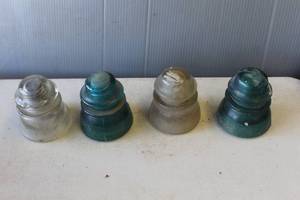 lot 761 image: Antique Hemingray Glass Company telephone line insulators