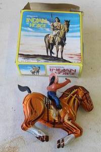 lot 770 image: vintage mechanical toy titled Indian on Horse made of lithographed tin-plated metal.  Video of it working
