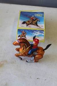 lot 771 image: vintage MTU Mechanical Cowboy on Horse tin lithograph wind-up toy, video of it working