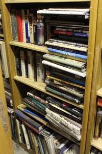 lot 811 image: 4-Shelfs of books see pictures for titles thats been locked away for years