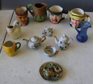 lot 821 image: collectible pottery character jugs, & miniature tea sets, and more see pictures for details