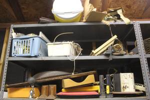 lot 831 image: 3 shelfs of of a mix of left over things that didnt match up with things