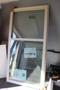 lot 858 image: window, branded  Tri-Supply never installed 35.5 inches wide by 71.5 inches high.