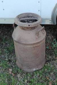 lot 882 image: rustic milk can about 2 feet tall