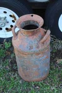 lot 883 image: rustic milk can a little over 2 feet tall