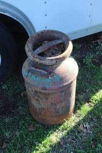 lot 884 image: rustic milk can about 2 foot tall