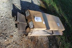 lot 886 image: 2 boxs of Brown siding see pictures for details (BIDDING IS 2X the bid )