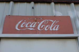 lot 891 image: metal Coca-Cola sign over 2 foot long
