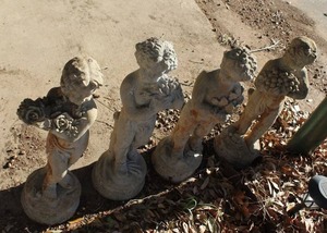 lot 897 image: garden statues, group of 4 themed around the Four Seasons. (Bid is x4)