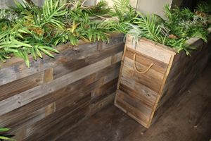 lot 137 image: Two Decorative wooden plant boxes - 61.5X17x31.5 each, does have small wheels on bottom.