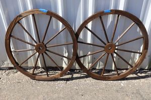 lot 251 image: Two decorative wagon wheels