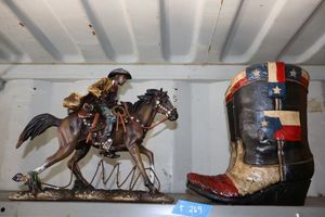 lot 23 image: Western style home dcor with Texas boots and riding cowboy
