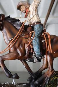 Western décor - cowboy roping calf figurine