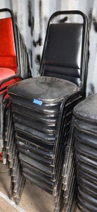 lot 160 image: Stackable black cushion chairs with metal frame - 12 total