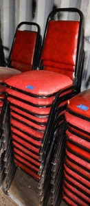 lot 163 image: Stackable red cushion chairs with metal frame - 12 total