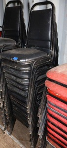 lot 168 image: Stackable black cushion chairs with metal frame - 12 total
