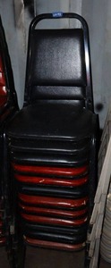 lot 192 image: Stackable red and black cushion chairs with metal frame - 12 total