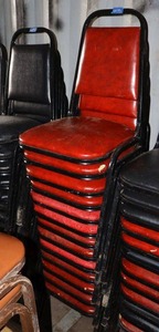lot 193 image: Stackable red cushion chairs with metal frame - 13 total
