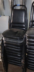 lot 195 image: Stackable black cushion chairs with metal frame - 11 total