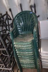 lot 197 image: Green plastic stackable chairs - 13 total