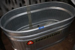 lot 203 image: CountyLine galvanized oval stock tank - 40 gal.