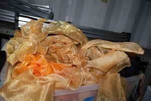 lot 71 image: Gold table linens and sheer pieces