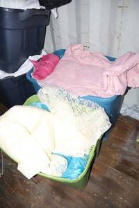 lot 98 image: Mixed linens Light pink, black and off-white lacy table linens with light blue sheer pieces